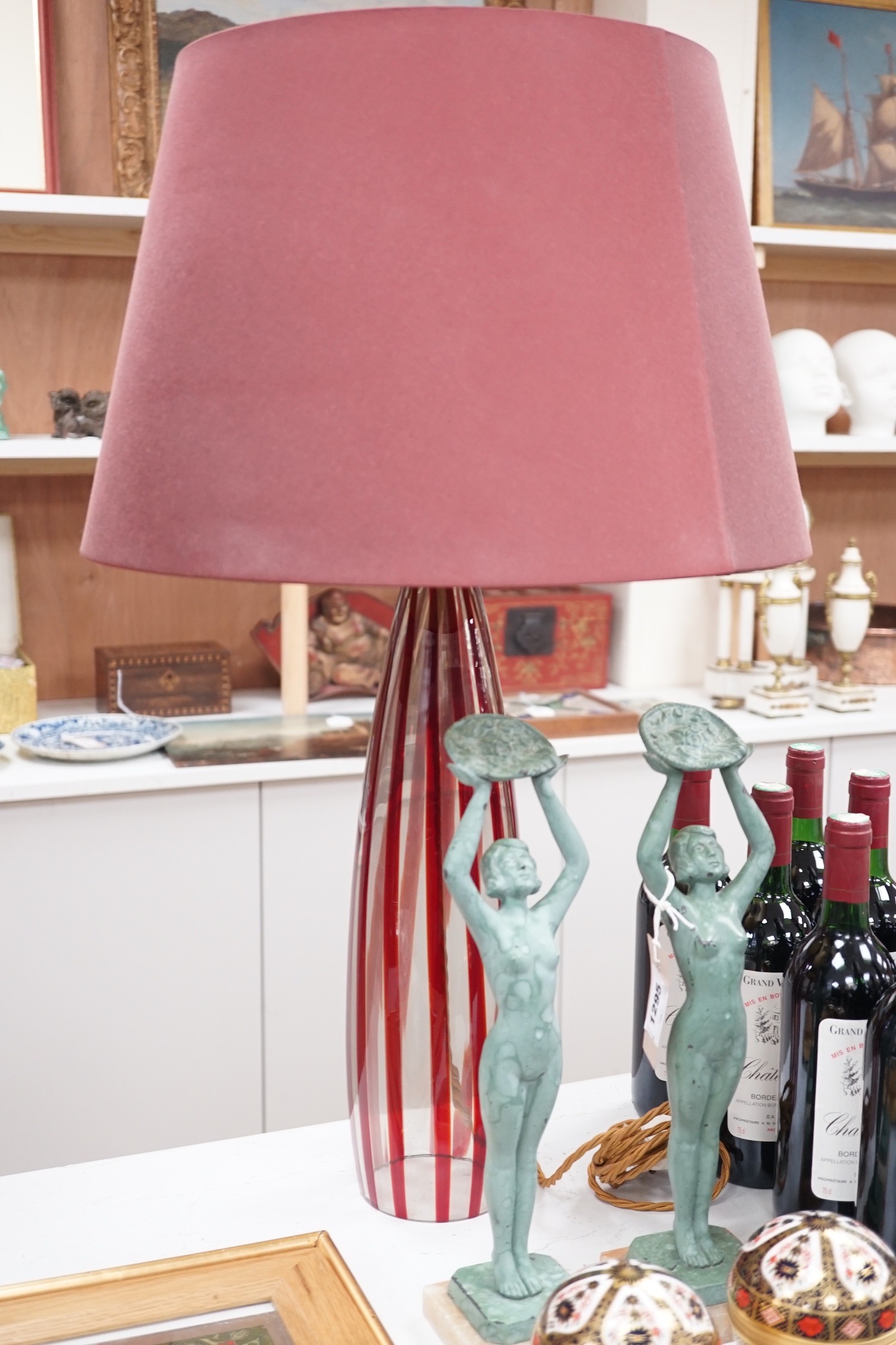 A pair of Murano style red stripe glass table lamps, 76cms high including shades